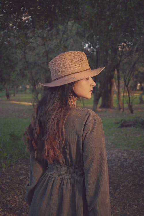 Brunette in Hat and Dress