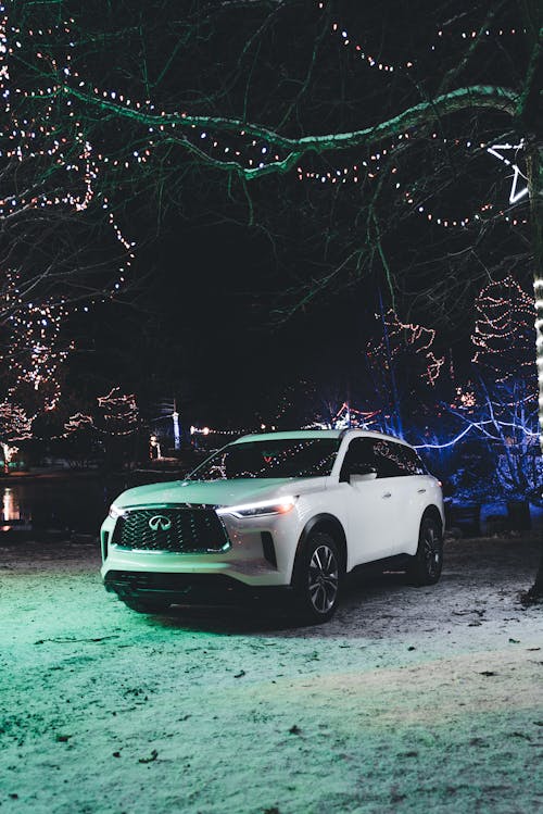 White 22 Infiniti QX60 SUV Illuminated by Christmas Lights 