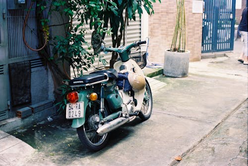 Motorbike Parked near Wall