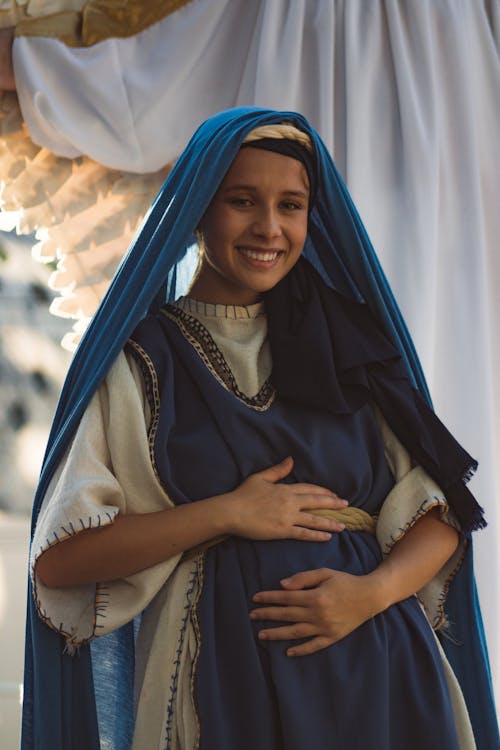 A Pregnant Woman in Traditional Wear · Free Stock Photo
