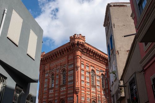 Free Explore the striking red brick architecture of Phanar Greek Orthodox College in Istanbul, a historic landmark. Stock Photo