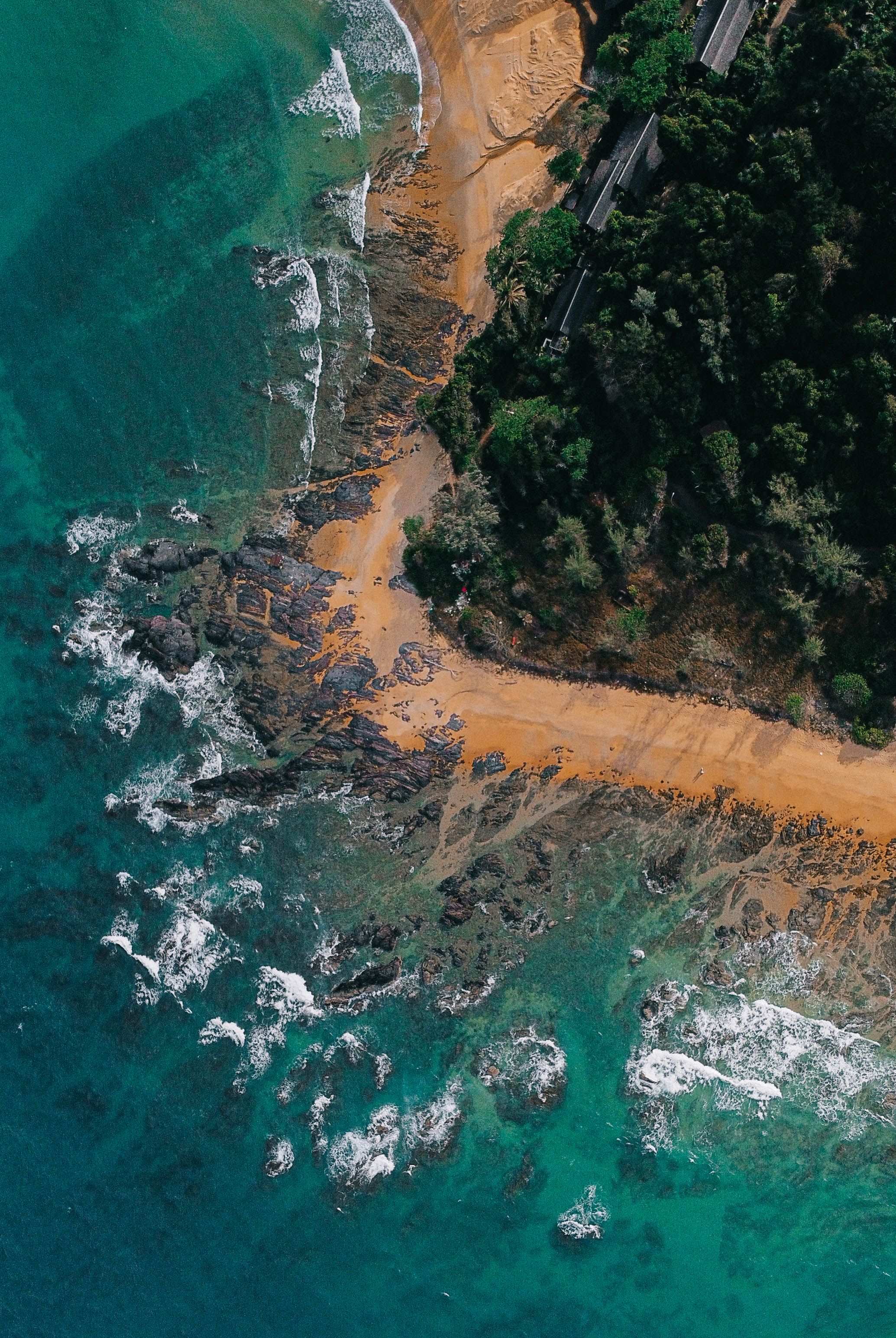 Aerial Footage of a Turquoise See, and Trees on a Sandy Coast · Free ...