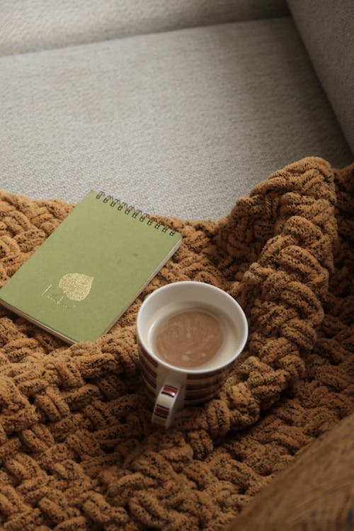 Coffee and Blanket on a Sofa 