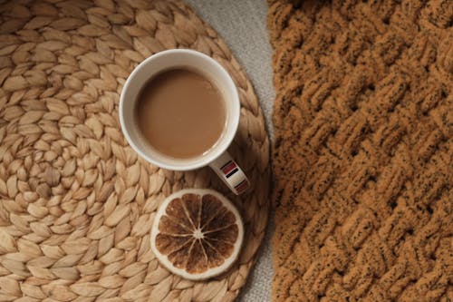 Coffee and Dried Orange on a Table 