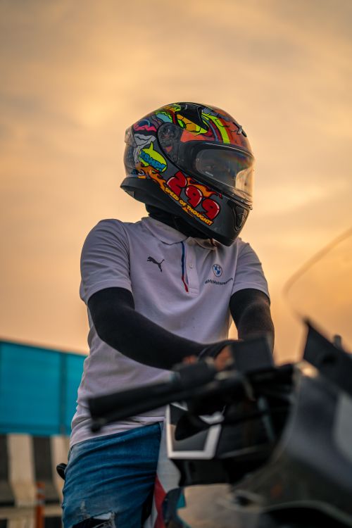 a person wearing motorcycle helmets Helmet Cover - Merman The merman design invites smiles and sparks imagination A person wearing a helmet