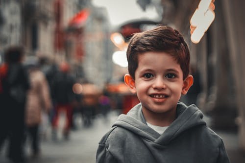 Portrait of Boy on City Street