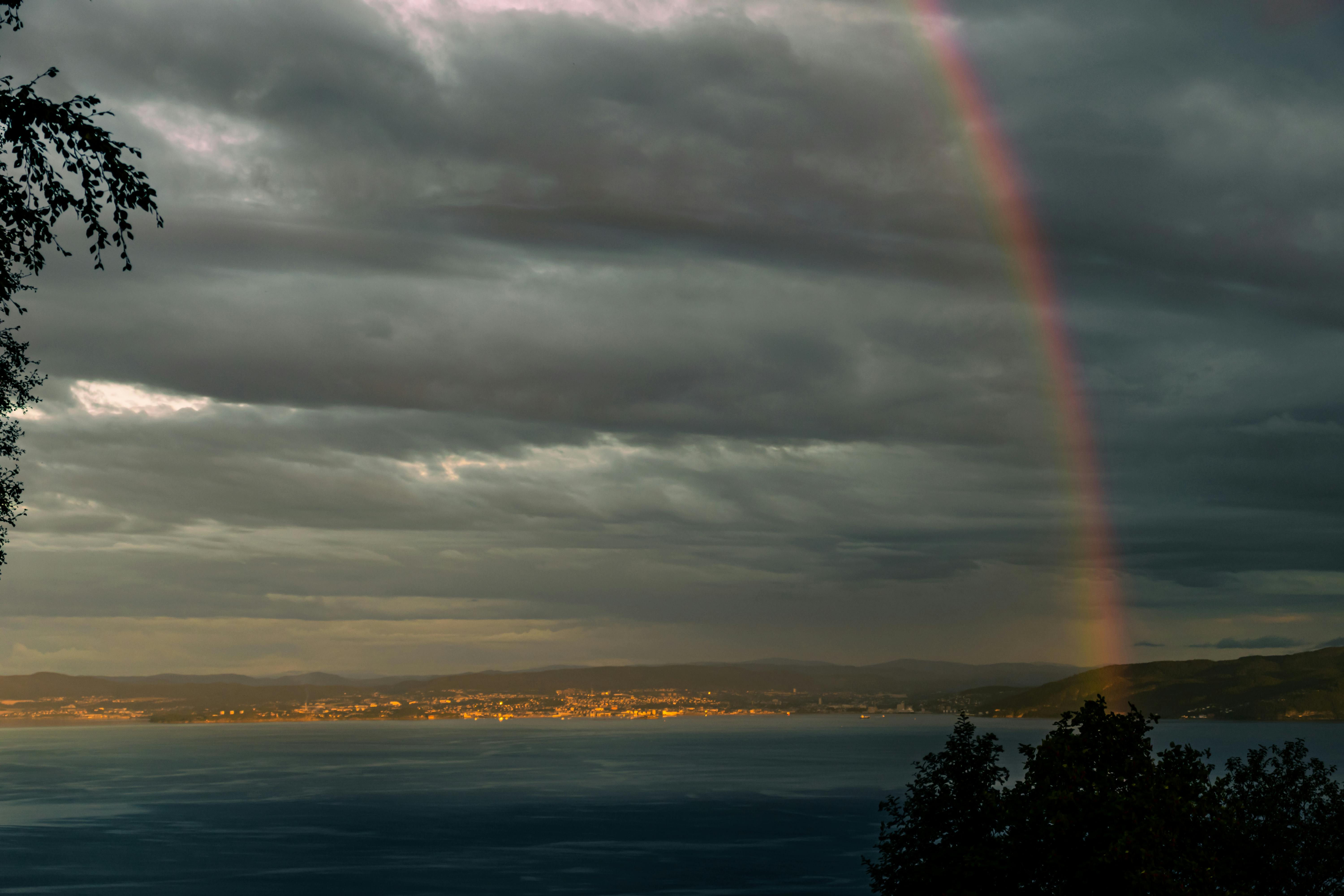 fjord of colors a breathtaking rainbow over trondheim s waters