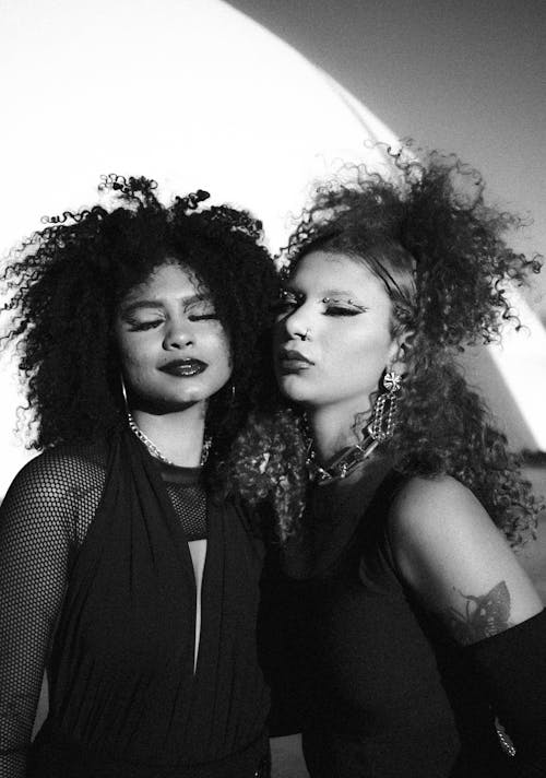 Black and White Shot of Two Women with Curly Hair