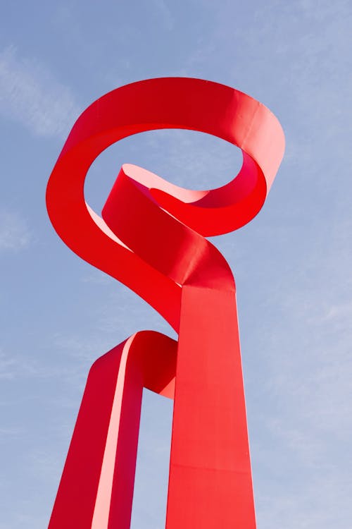 Free Low Angle Shot of an Abstract Red Sculpture Stock Photo