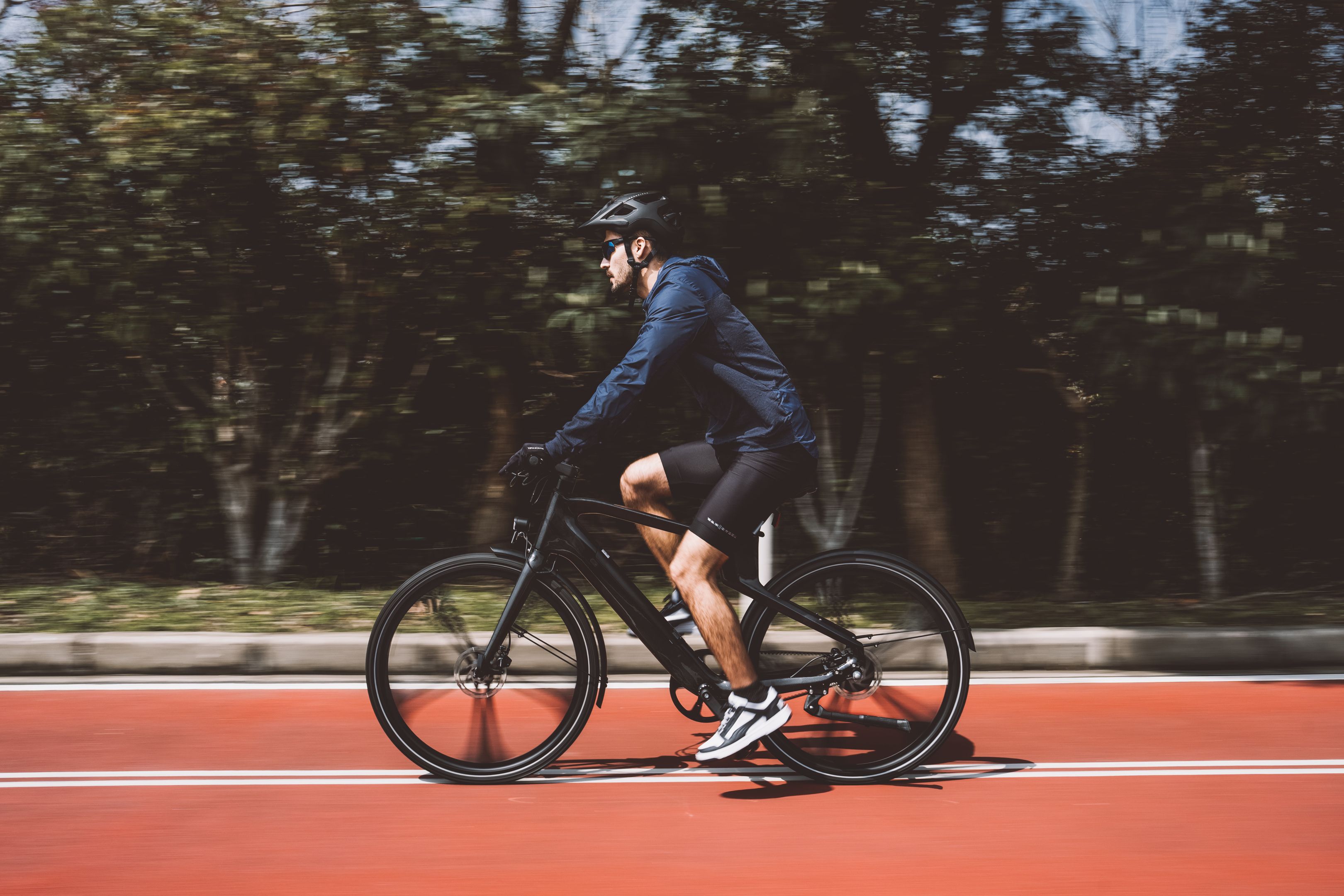 Man Riding a Bike on a Truck · Free Stock Photo