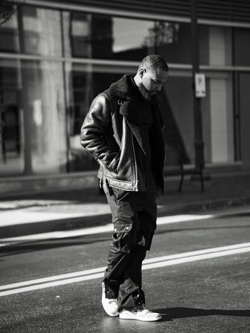 Man walking on the road wearing all black leather