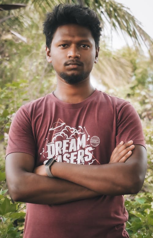 Portrait of Young Indian Man in Summer Park