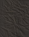 Dark, Wrinkled Paper Surface