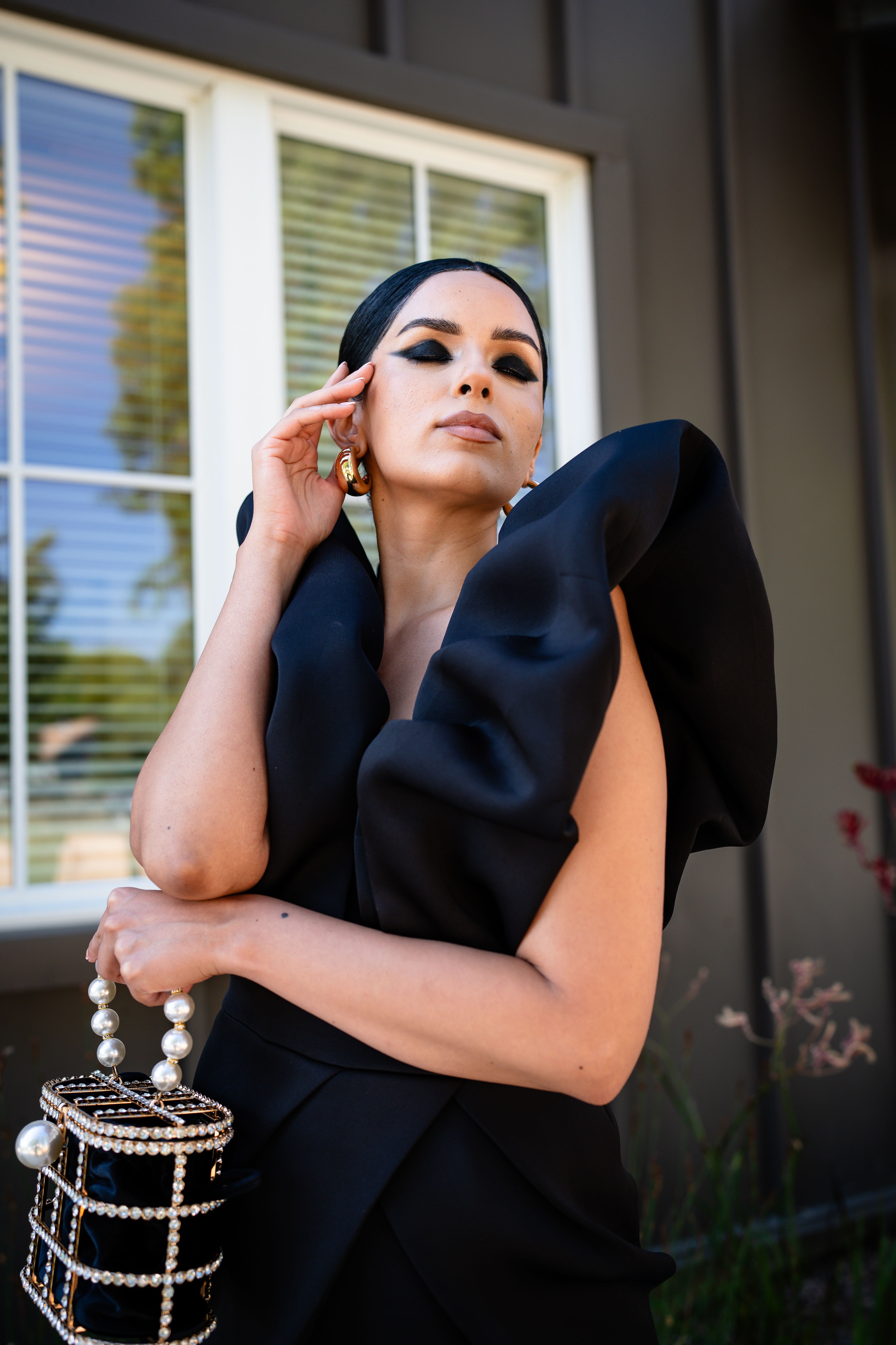 Portrait of Elegant Woman Wearing Black Dress · Free Stock Photo