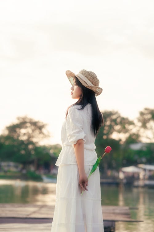 Woman Wearing White Dress by the Lake 