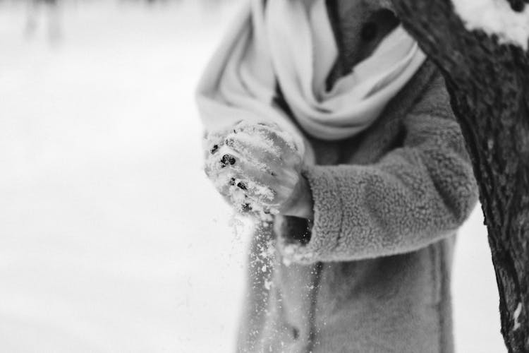 Person Making Snowball