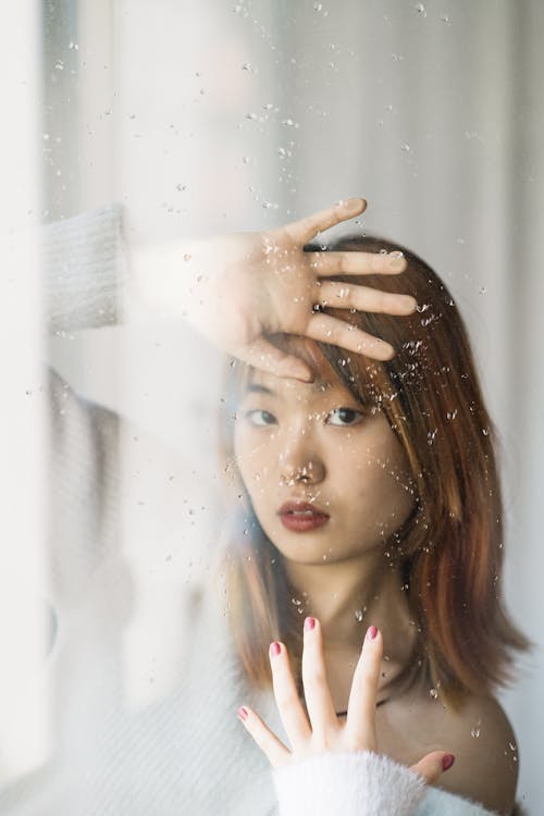 Portrait of Brunette Asian Woman in White 