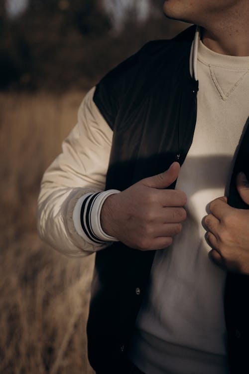 A Person Standing Outdoors 