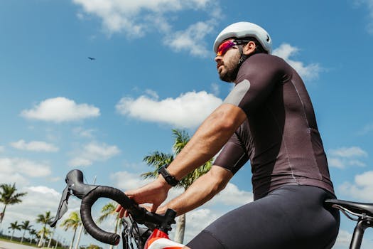 A cyclist enjoys a sunny day outdoors, perfectly capturing the spirit of adventure and fitness.