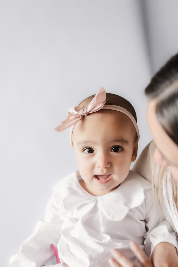 Mother And Cute Baby Daughter