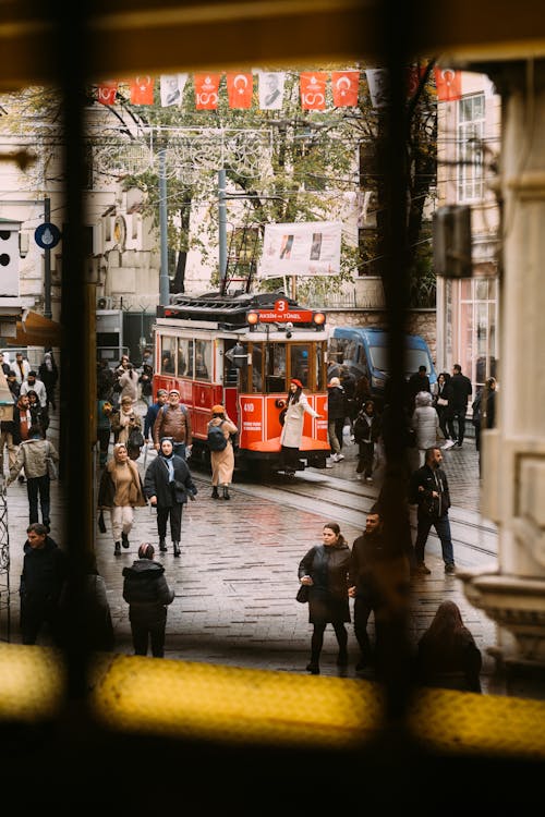 Tram and Pedestrians on a Busy Street in Istanbul, Turkey