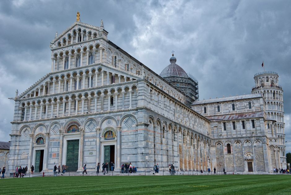 A majestic view of Pisa Cathedral and Leaning Tower in Tuscany, showcasing iconic Italian architecture.