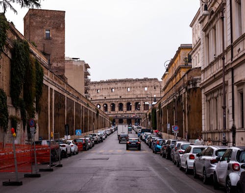 A Street with View of the Colosseum in Rome, Italy 