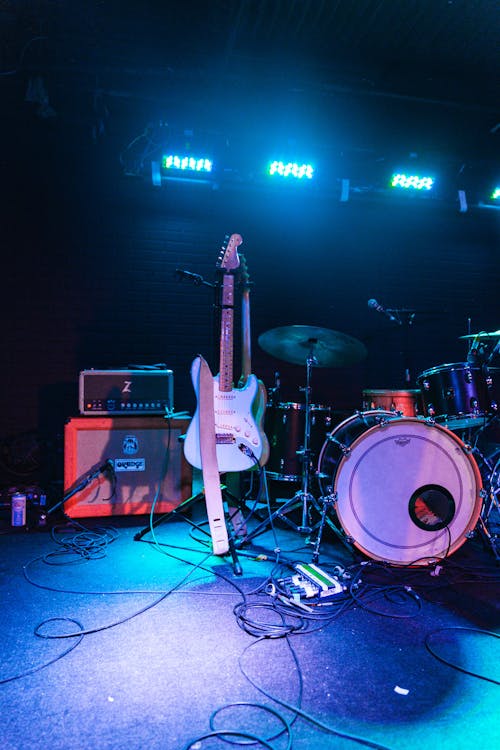 Free Photo of Electric Guitar and Drum Set Stock Photo