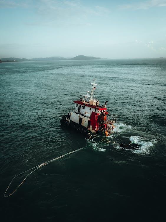 Sunken Fishing Boat Moored on Sea Coast