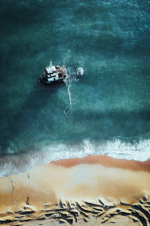 Darmowe zdjęcie z galerii z fotografia lotnicza, łódź, morze