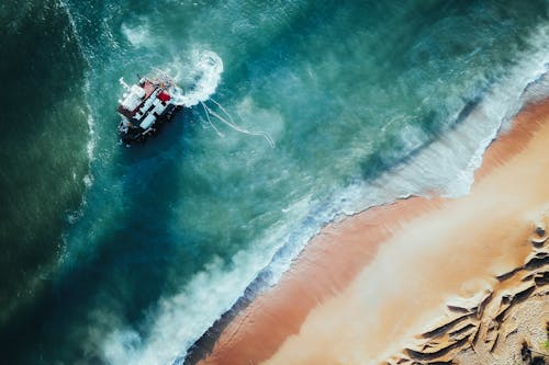 Aerial View of a Shipwreck near the Shore