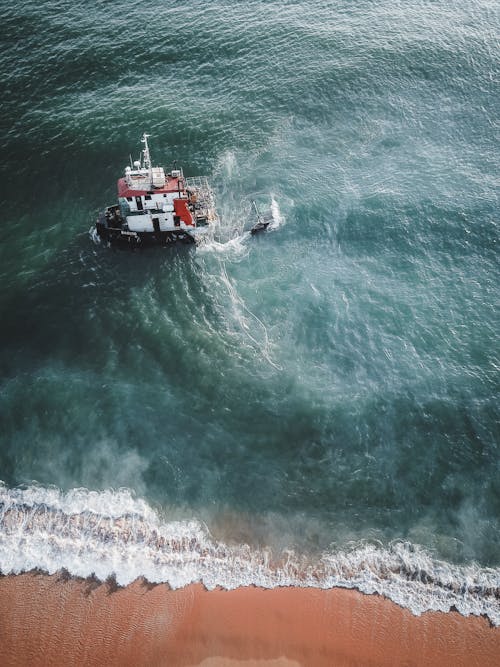 Sunken Fishing Boat on Sea Shore