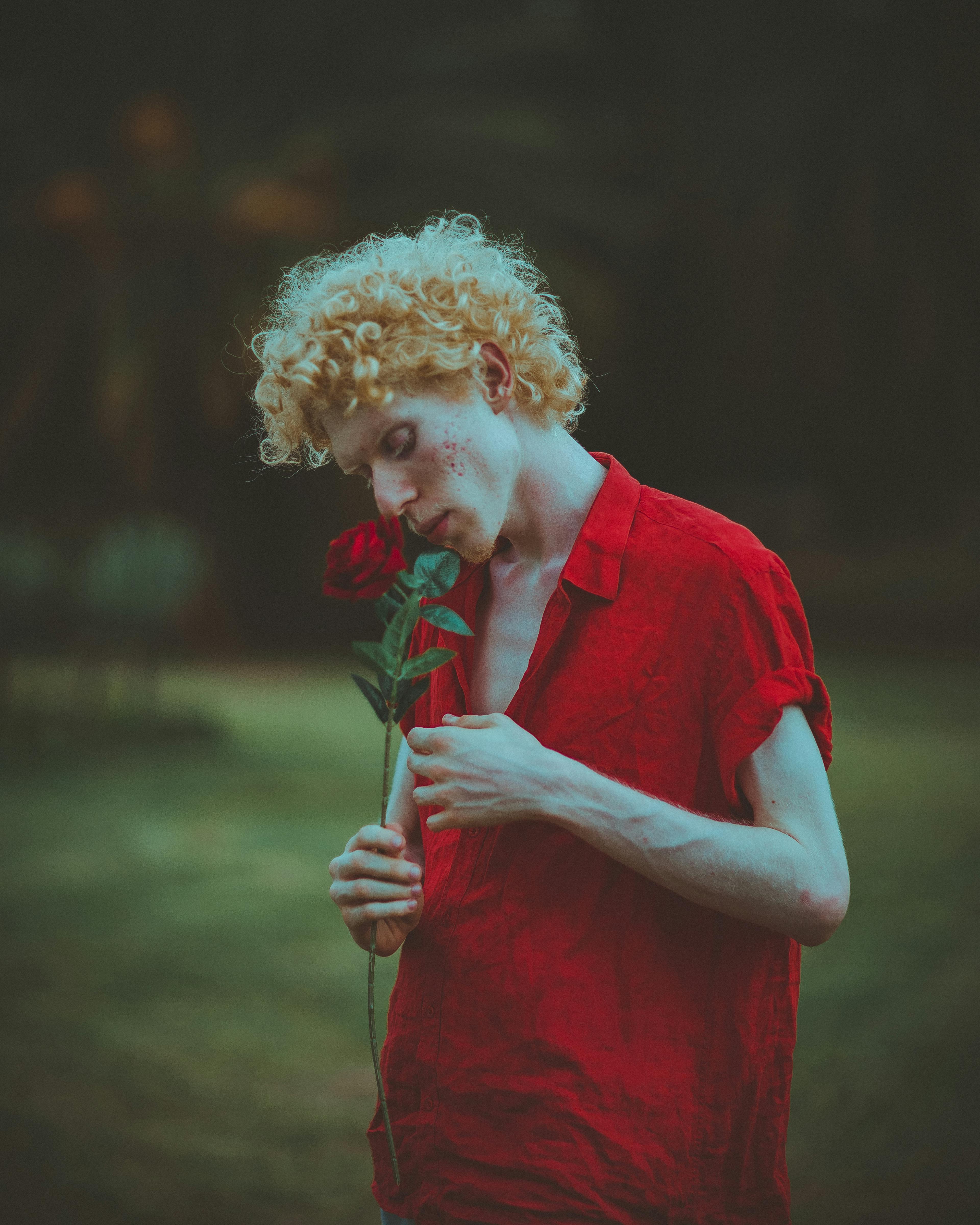 Man Smelling Red Rose · Free Stock Photo