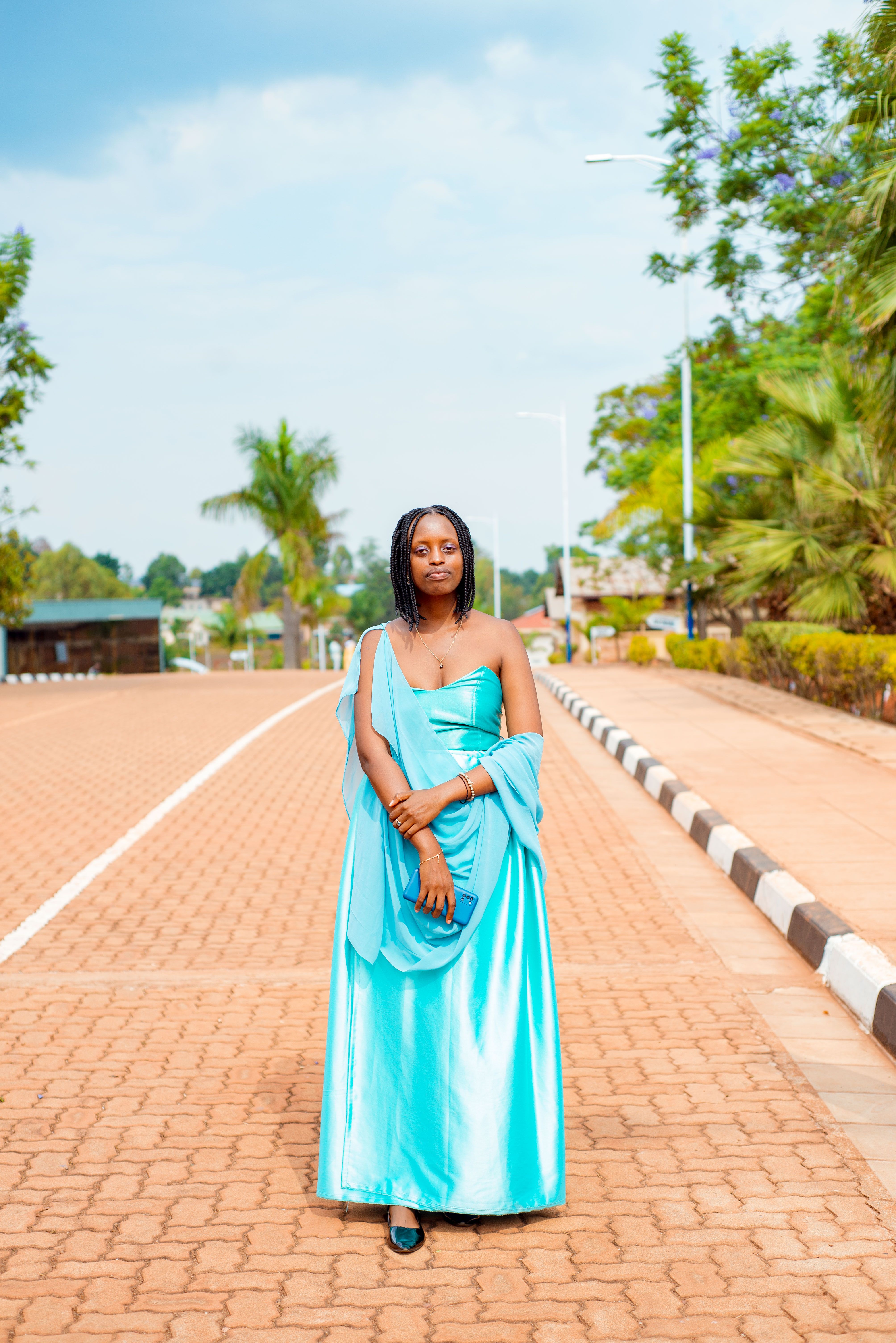 A Woman Posing in a Dress · Free Stock Photo