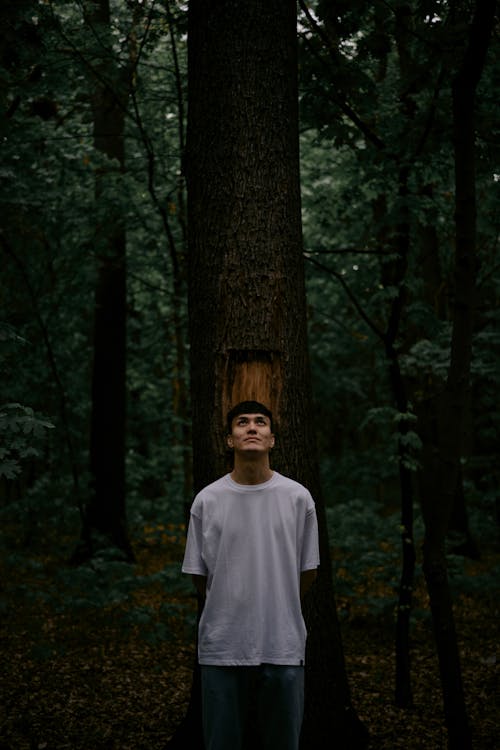 Man Leaning on a Tree 