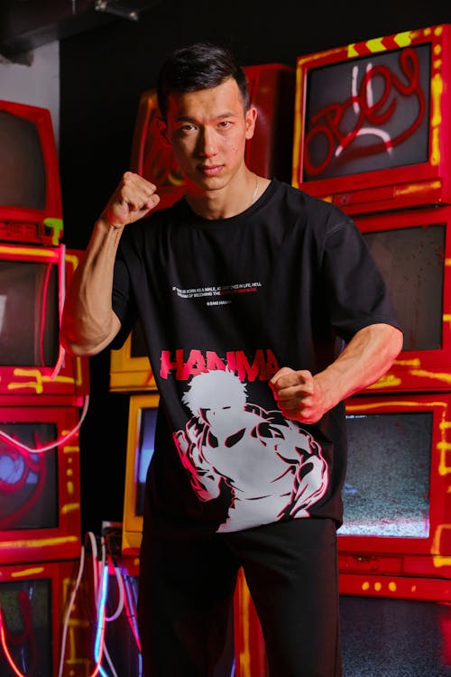 Foto profissional grátis de artes marciais, camiseta, de pé