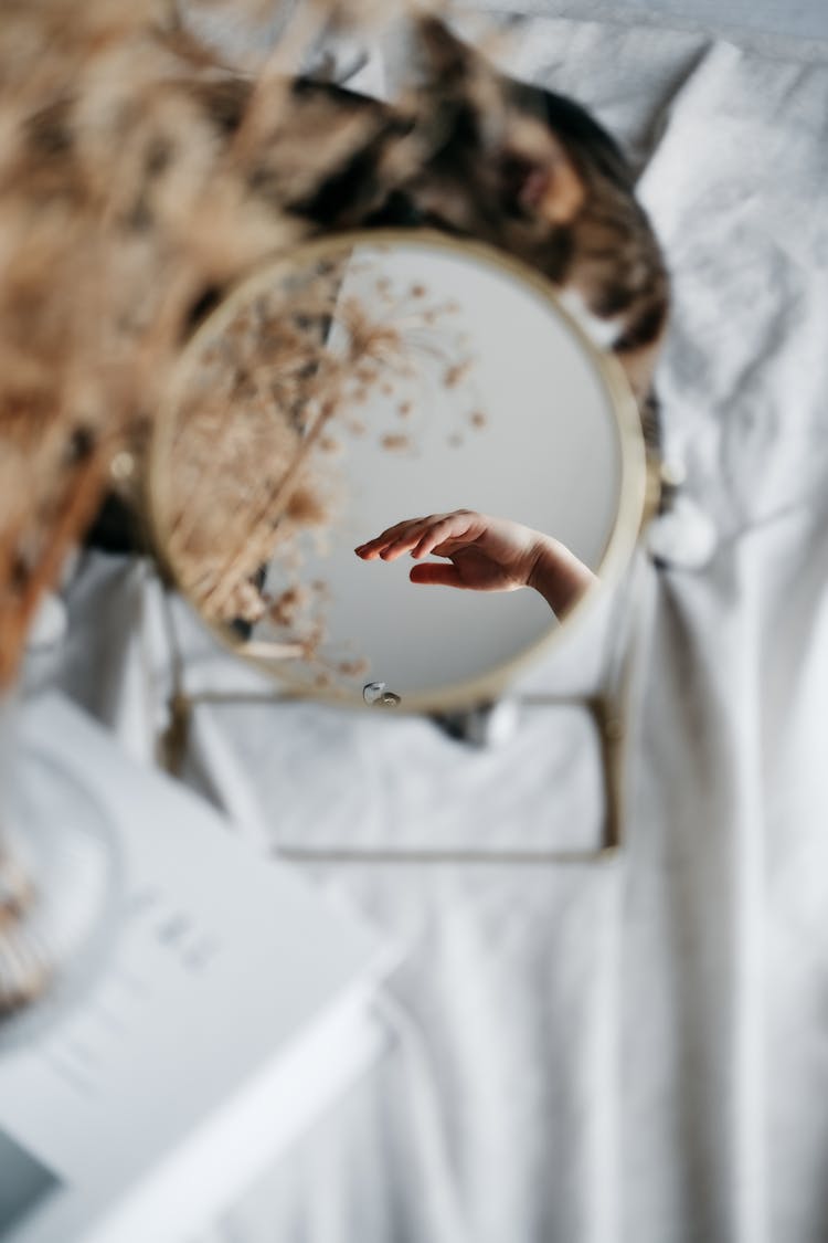 Hand Reflection In Mirror