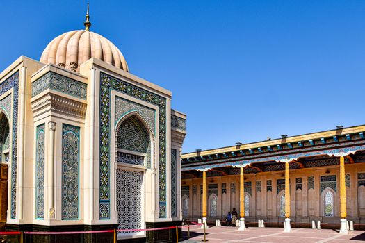 Sunlit view of the Hazrat Khizr Mosque showcasing intricate Islamic architecture in Samarkand, Uzbekistan.