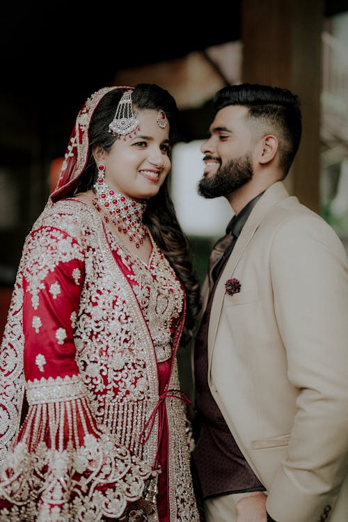 Bride in Traditional Dress with Groom