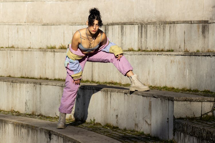 Young Woman In A Casual Outfit Posing Outside 