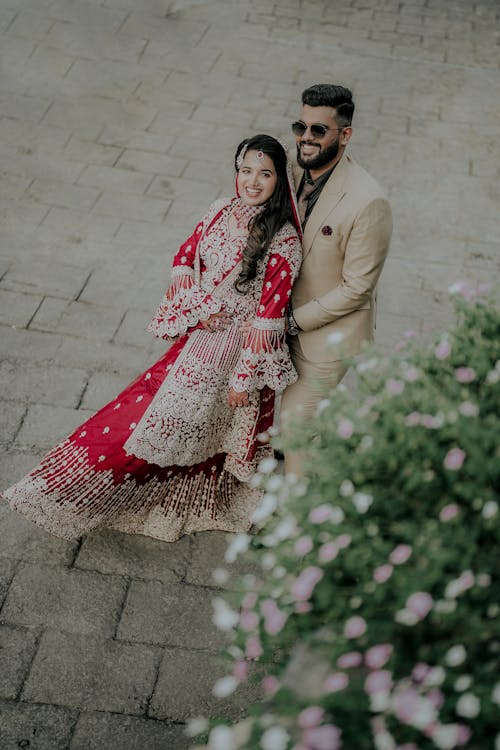 Newlyweds Smiling and Embracing