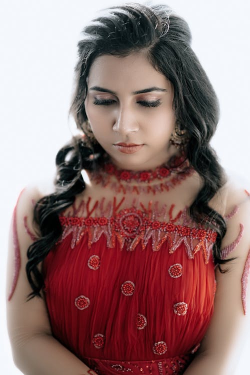 Portrait of Woman with Black Hair and in Red Dress