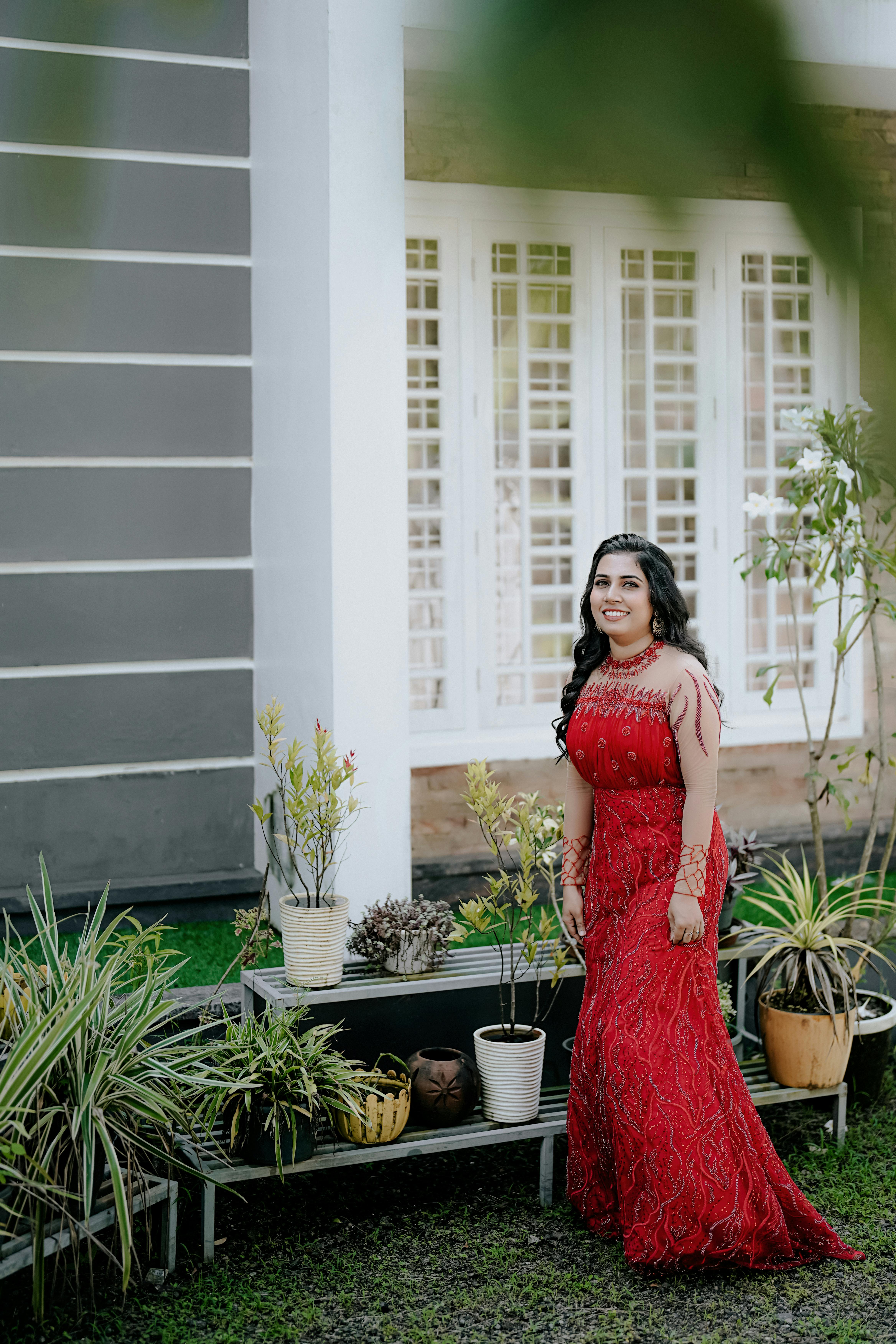 Indian couple posing out in garden for photoshoot. | Photo 264944