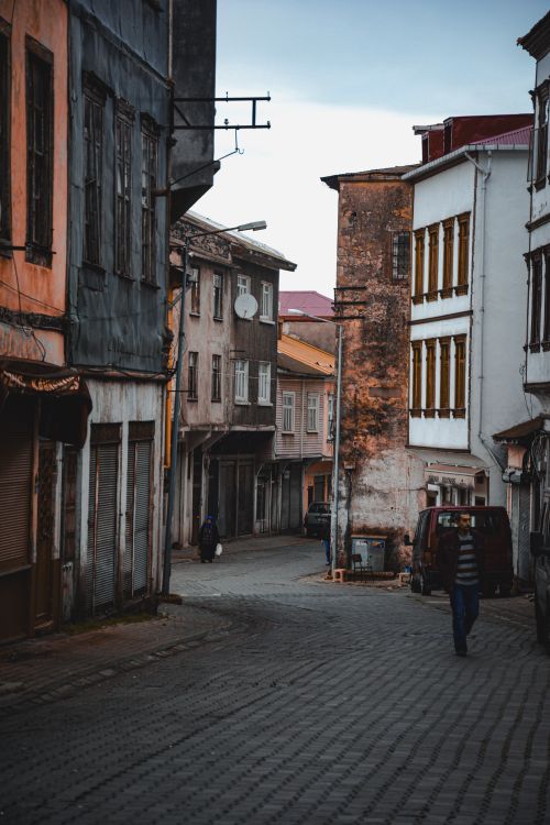 Free Charming narrow alley surrounded by old tenements in Istanbul, Turkey, showing rustic urban architecture. Stock Photo