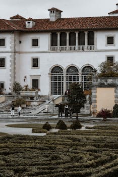 Explore the elegant European-style architecture of Vizcaya Museum surrounded by lush gardens.