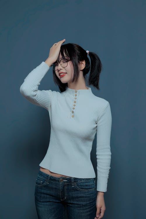 Woman Wearing Jeans and Eyeglasses