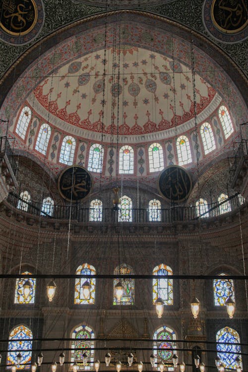 Interior of the Blue Mosque with an Ornamental Dome and Stained Glass Windows