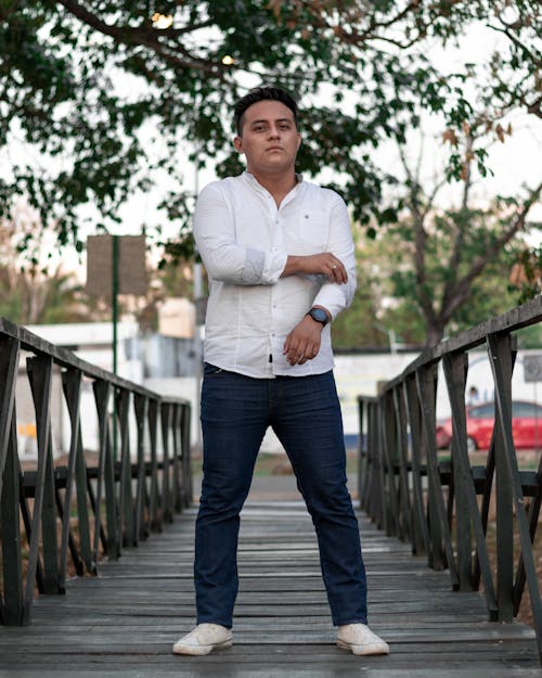 Brunette Man in White Shirt