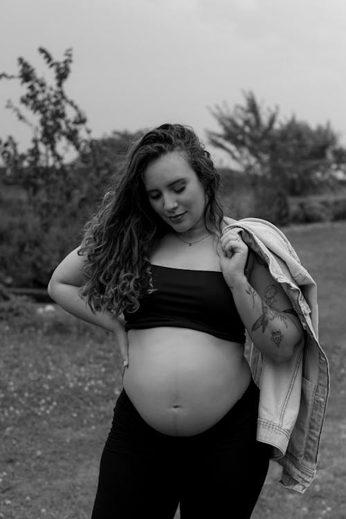 Pregnant Woman on a Walk in the Countryside