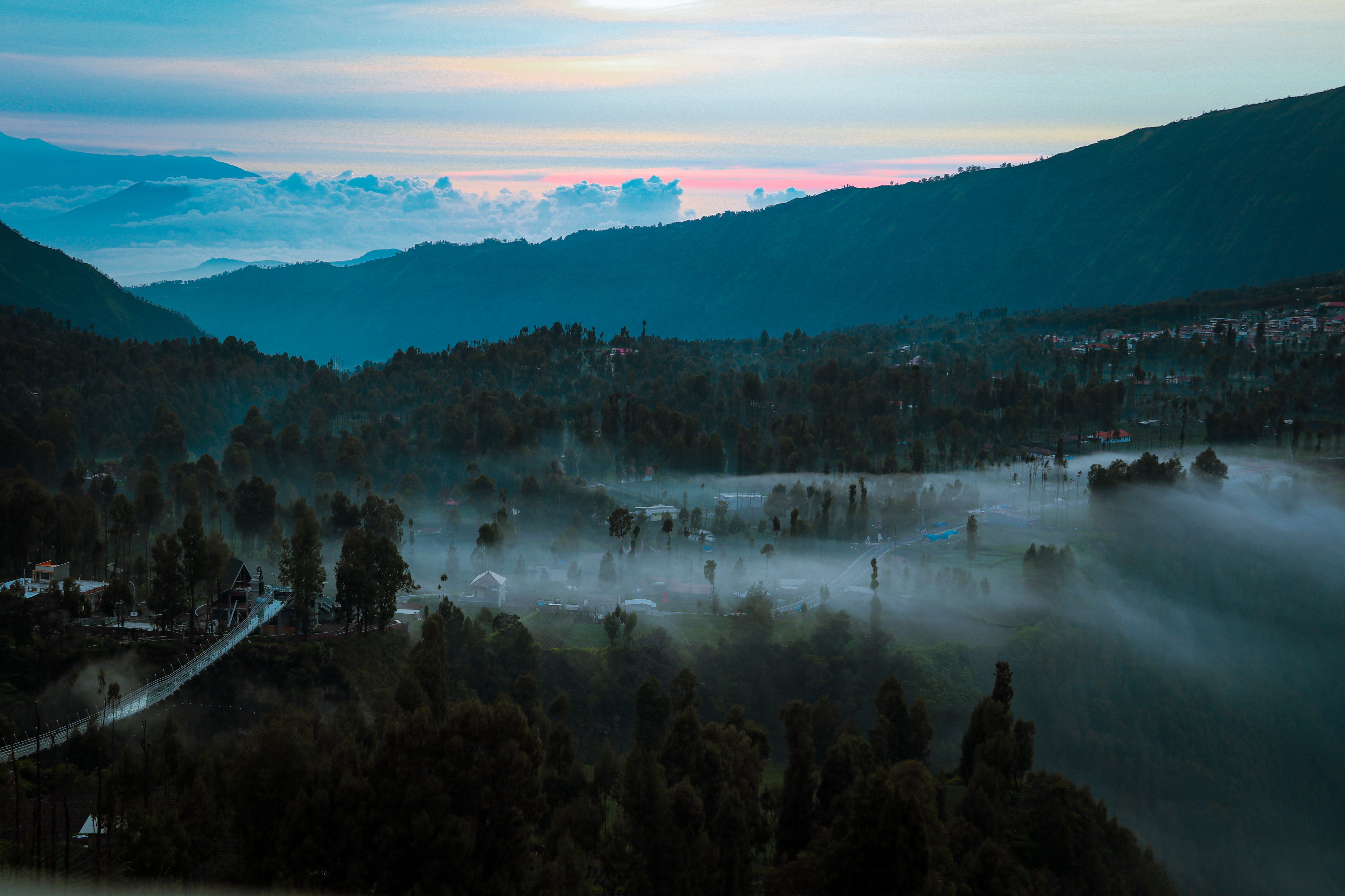 Aerial View of a Mountain Valley in Fog · Free Stock Photo